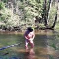 Naked in the creek and cum.