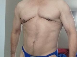 Old guy and his small muscle flexing 2 of 11