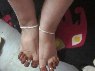 Beautiful feet wearing different kind of chain 2 of 20