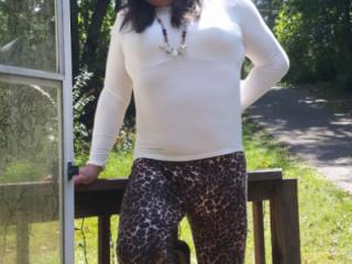 White shirt and leopard pants 9 of 12