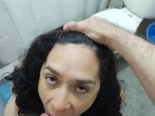 Sonia sucking and posing in the bathroom