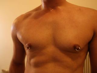 Freshly shaven and nipple rings 2 of 4