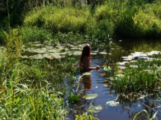in a weedy pond