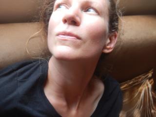Shelly on the brown couch 1 3 of 11