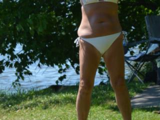 Sunbathing in Town Park Wearing White Bikini 8 of 18