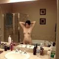 Naked in the mirror after the bath.