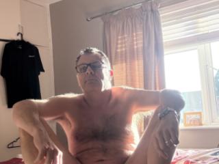 Posing on the bed 3 of 7