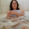Anita taking a bath