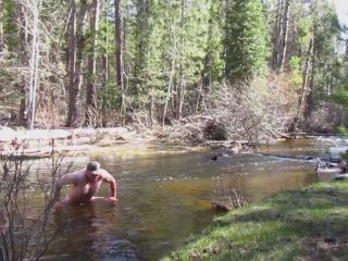 Naked bathing in the creek.