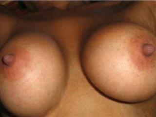 Photos of the breasts of my mature bitch, close ups of her delicious nipples and more. 19 of 20