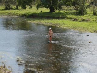 Nude in river's water 5 of 20