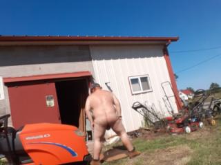Mowing  in Birthday suit outside
