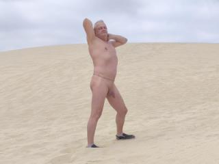 Naked in the beach dunes 4 of 12