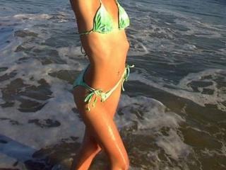 Natasha from newport. Green bikini 1 of 19