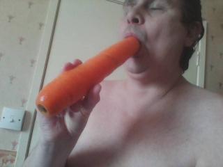 Fun with a large carrot 1 of 9