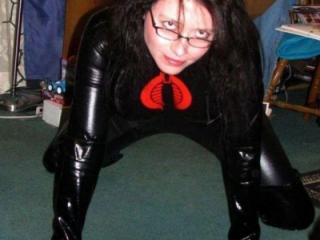Eager to Choke on Your Cock in My Shiny Black Catsuit 10 of 15