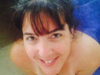 mature brunette in red 7 of 11