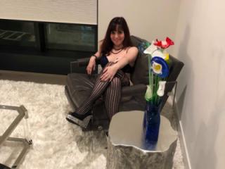 cutie brunette posing and playing 5 of 20