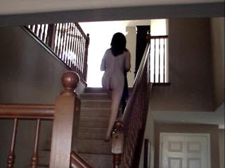 Walking up the stairs naked this time.
