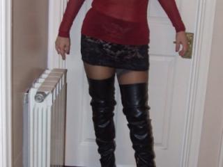 Jane wears red and adds thigh boots 11 of 14