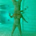 Petra naked in the public swimming po...