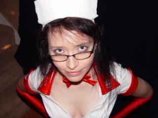 Ready to Suck Your Cock Dry in my PVC Nurse Outfit 1 of 6