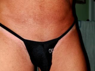 Tiny black thong 17 of 18