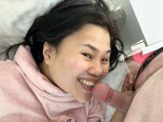 Asian wife blowing 5 of 8