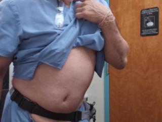 Old guy showing off his little muscle 3 of 4
