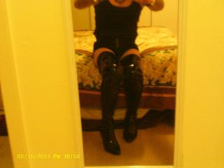 Boy shorts, leather thigh high boots 7 of 9