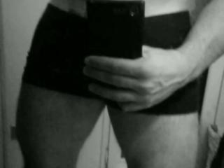 Pulling my soft cock out of my underwear (B&W)