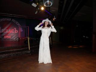 In Wedding Dress and White Hat on stage 17 of 20