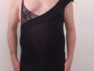 Sissy crossdresser wearing mini black dress 6 of 20