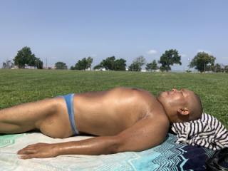 Sunbathing in Bayonne Park_light blue CK thong 2 of 20