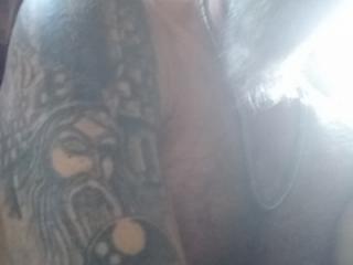 Tattoo and pierced nipples 1 of 4