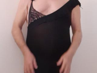 Sissy crossdresser wearing mini black dress 15 of 20