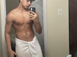 Muscular Asian and his dick pic 1 of 4