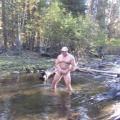 Jerking it in the river.