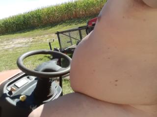 Mowing  in Birthday suit outside 1 of 8