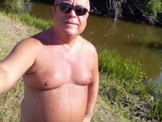 Hungarian nudist fisherman 3 of 9