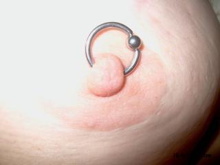 Her new 8 guage rings 1 of 4
