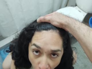 Sonia sucking and posing in the bathroom 3 of 12