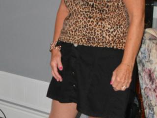 Foxy Cougar Dressed in Leopard Print 3 of 16