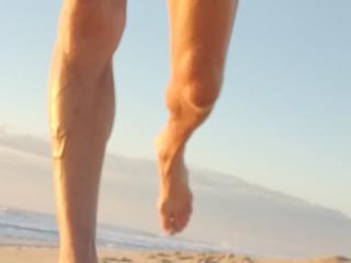 Celebrating 66 with a nude run on the beach. 9 of 10