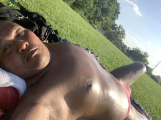 Sunbathing my pink thong in Bayonne Park. 7 of 17