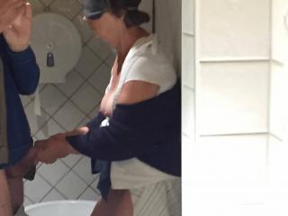 Odile is fucked in toilets for men 13 of 14