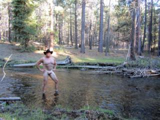 Naked on the trail and bathing in the creek.