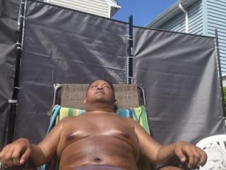 Sunbathing in my backyard in brown thong!!! I bet I STINK! 5 of 19