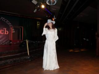 In Wedding Dress and White Hat on stage 18 of 20