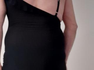 Sissy crossdresser wearing mini black dress 7 of 20